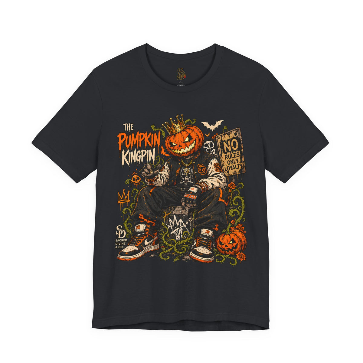 The Pumpkin Kingpin Tee product mockup with crowned jack-o'-lantern holding a No Rules Only Loyalty sign