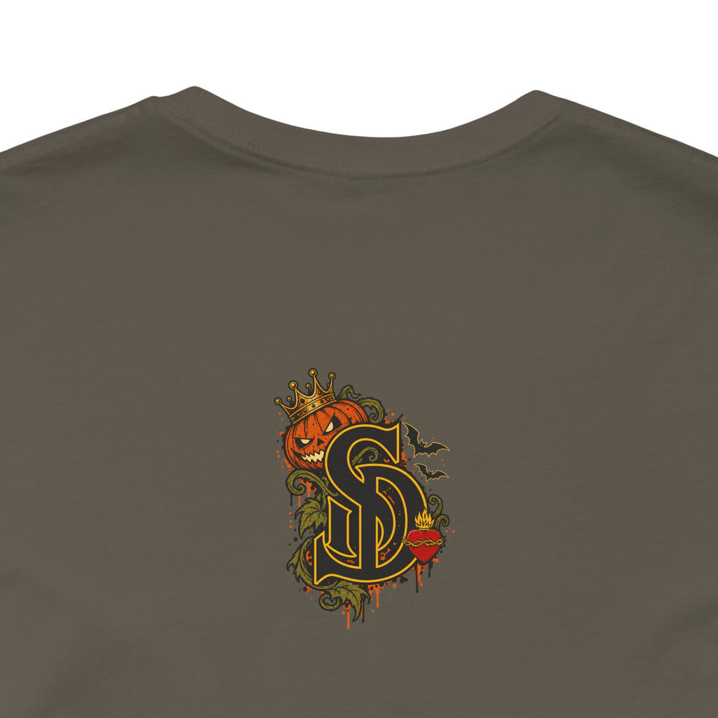 The Pumpkin Kingpin Tee product mockup with crowned jack-o'-lantern holding a No Rules Only Loyalty sign