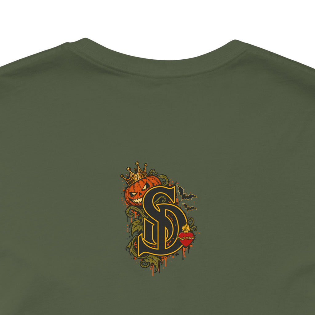 The Pumpkin Kingpin Tee product mockup with crowned jack-o'-lantern holding a No Rules Only Loyalty sign