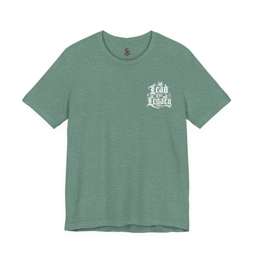Lead the Legacy Graphic Tee heather dusty blue front flat-lay — Lead the Legacy gothic script left chest pocket logo