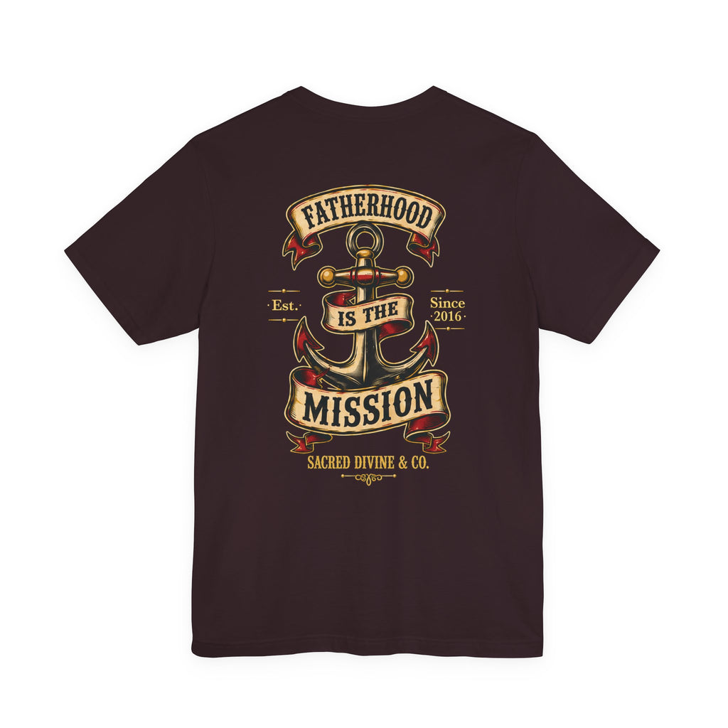 Fatherhood Is the Mission Tee oxblood black back flat-lay — Fatherhood Is the Mission vintage anchor banner full back graphic with Sacred Divine & Co. wordmark