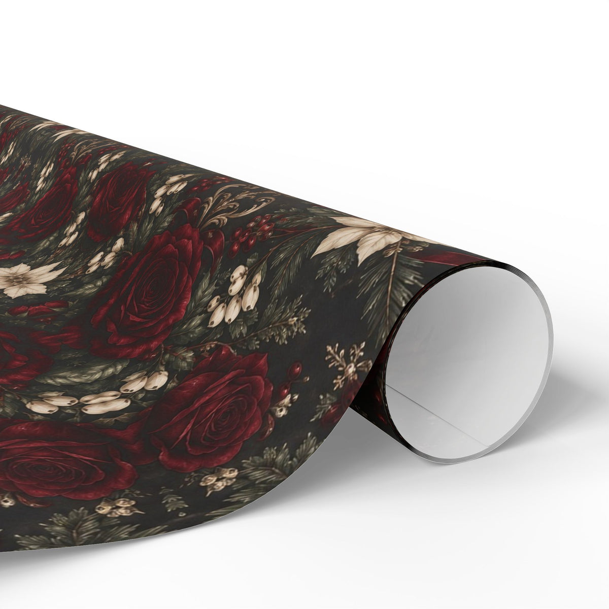 Overhead view of Burgundy Floral Pattern wrapping paper with a wrapped gift and scissors, clear tape, twine, and paper tags on a wood tray.