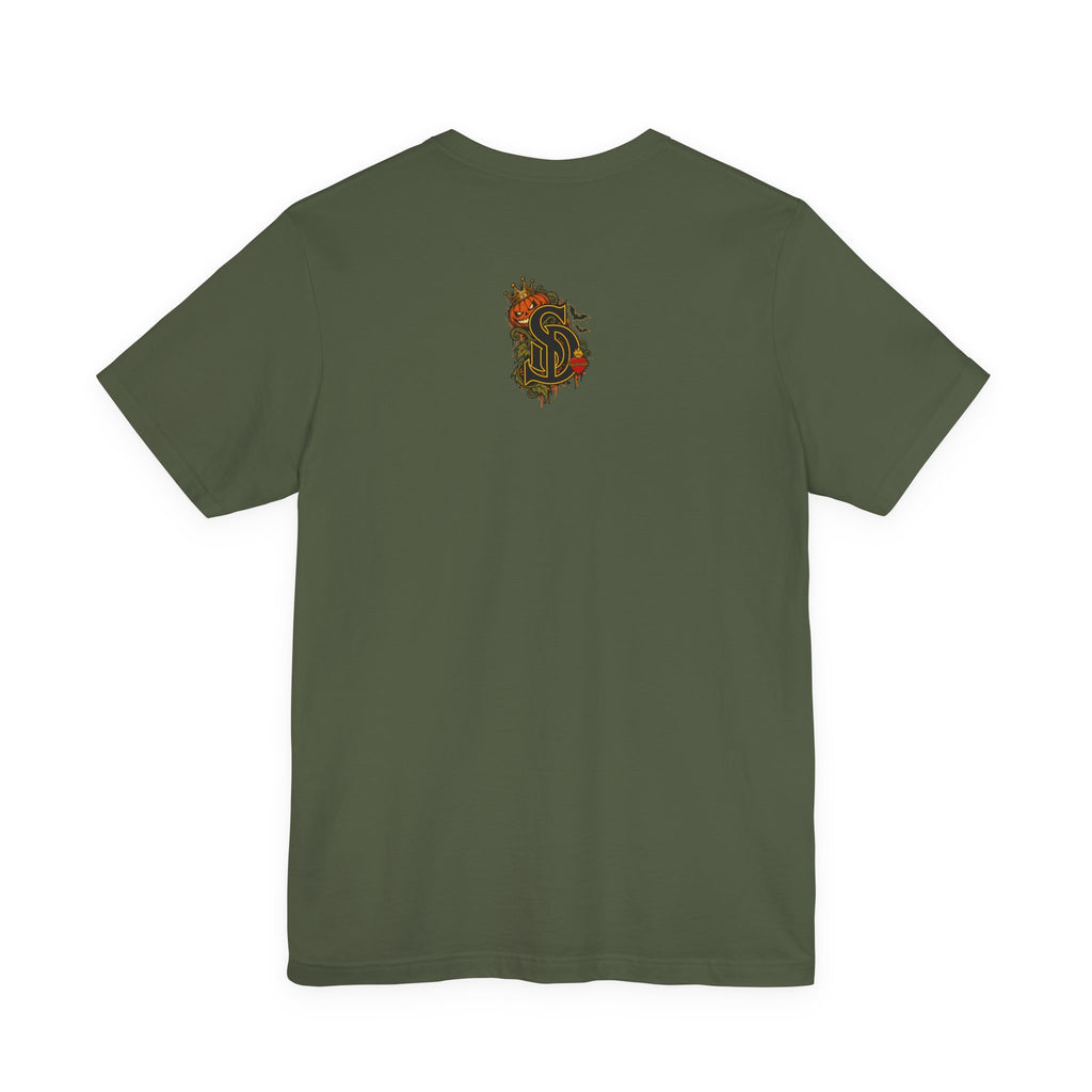 The Pumpkin Kingpin Tee product mockup with crowned jack-o'-lantern holding a No Rules Only Loyalty sign