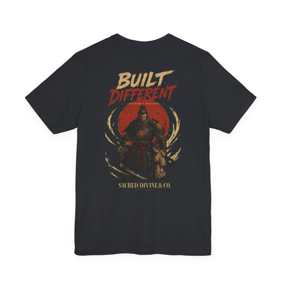 Built Different Tee vintage black back flat-lay — Built Different The Dad I Needed warrior crest full back graphic and Sacred Divine & Co. wordmark
