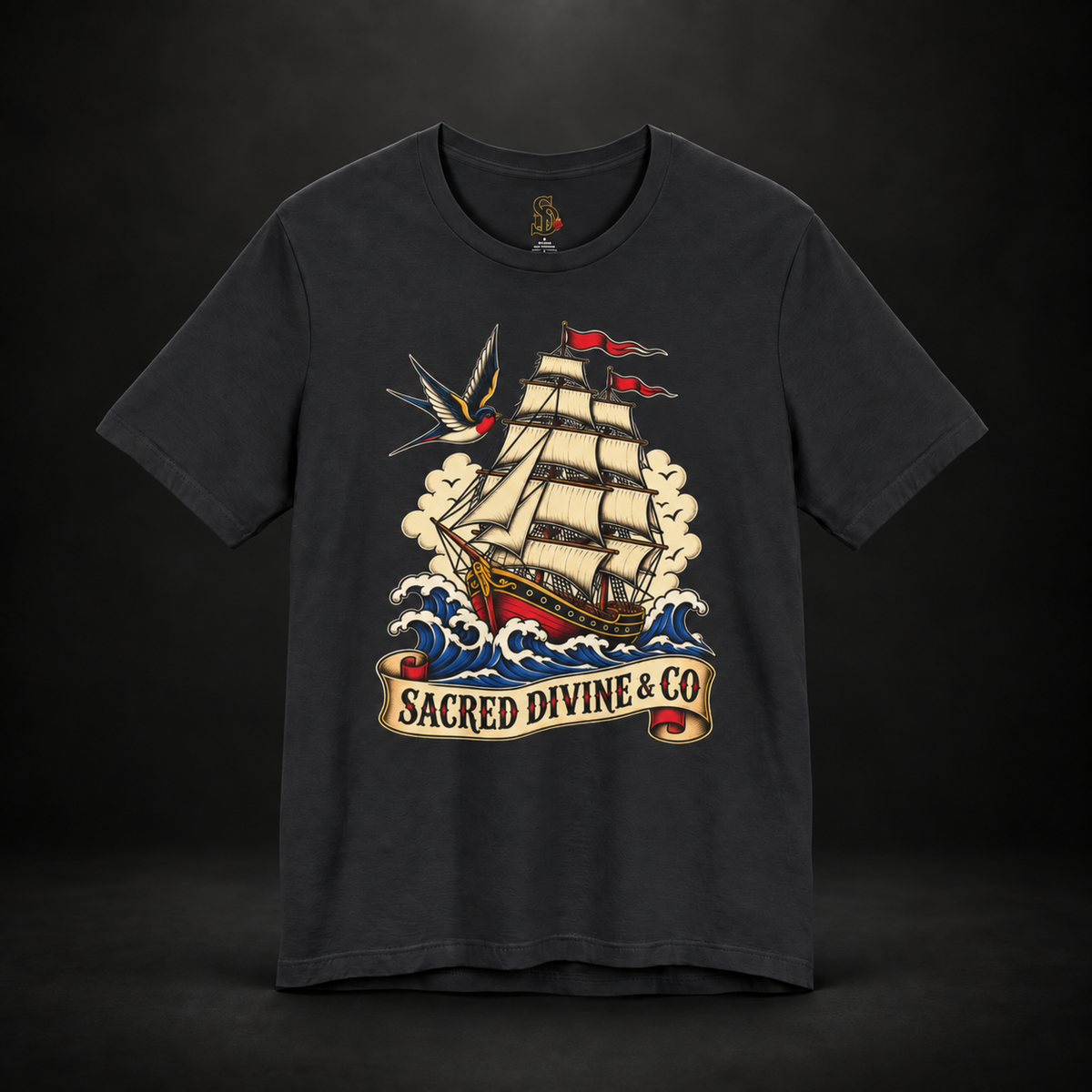 Sailing Tattoo Ship Tee with stylized wave graphic details