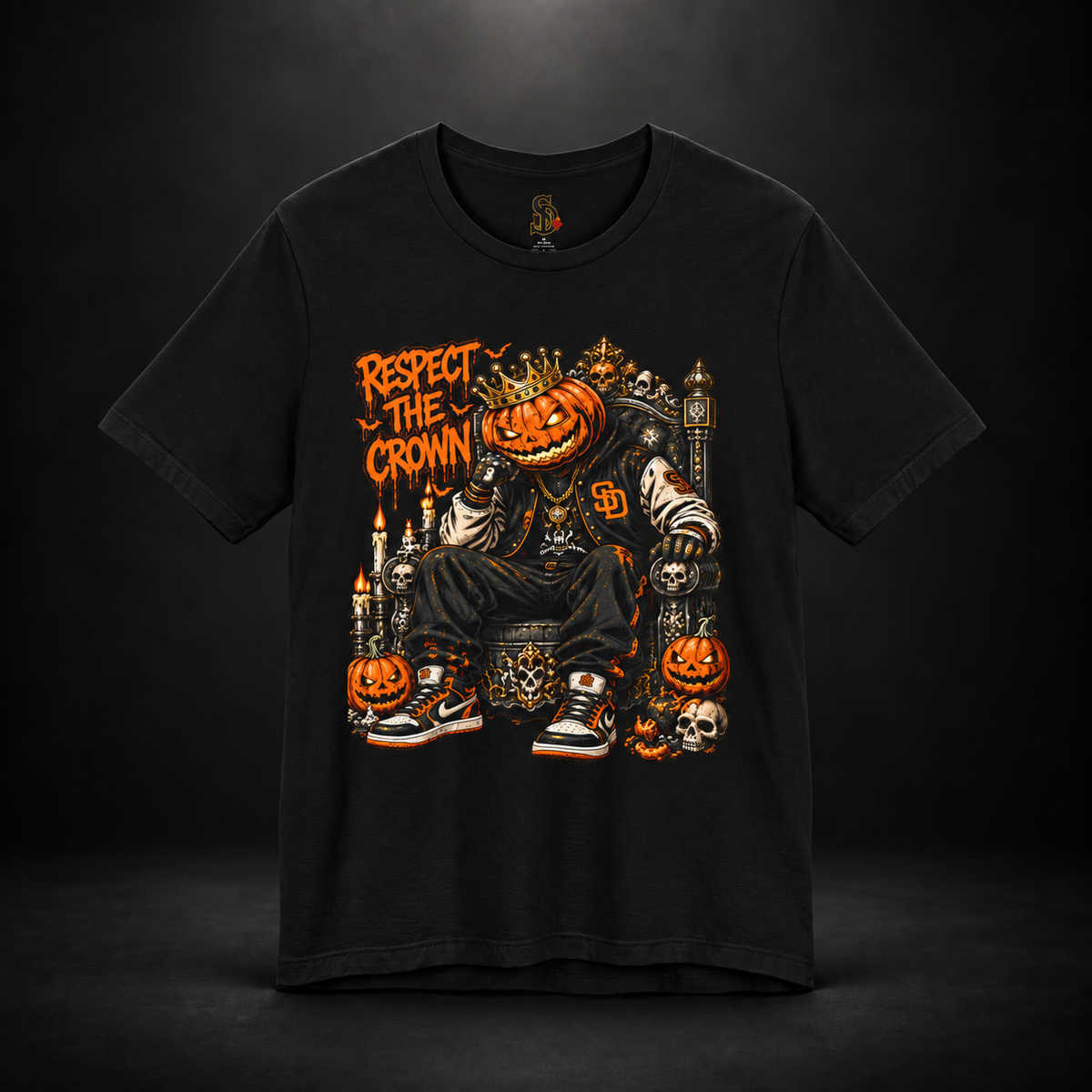 Pumpkin King Respect the Crown Tee with crowned jack-o'-lantern, skull and candle artwork by Sacred Divine & Co.