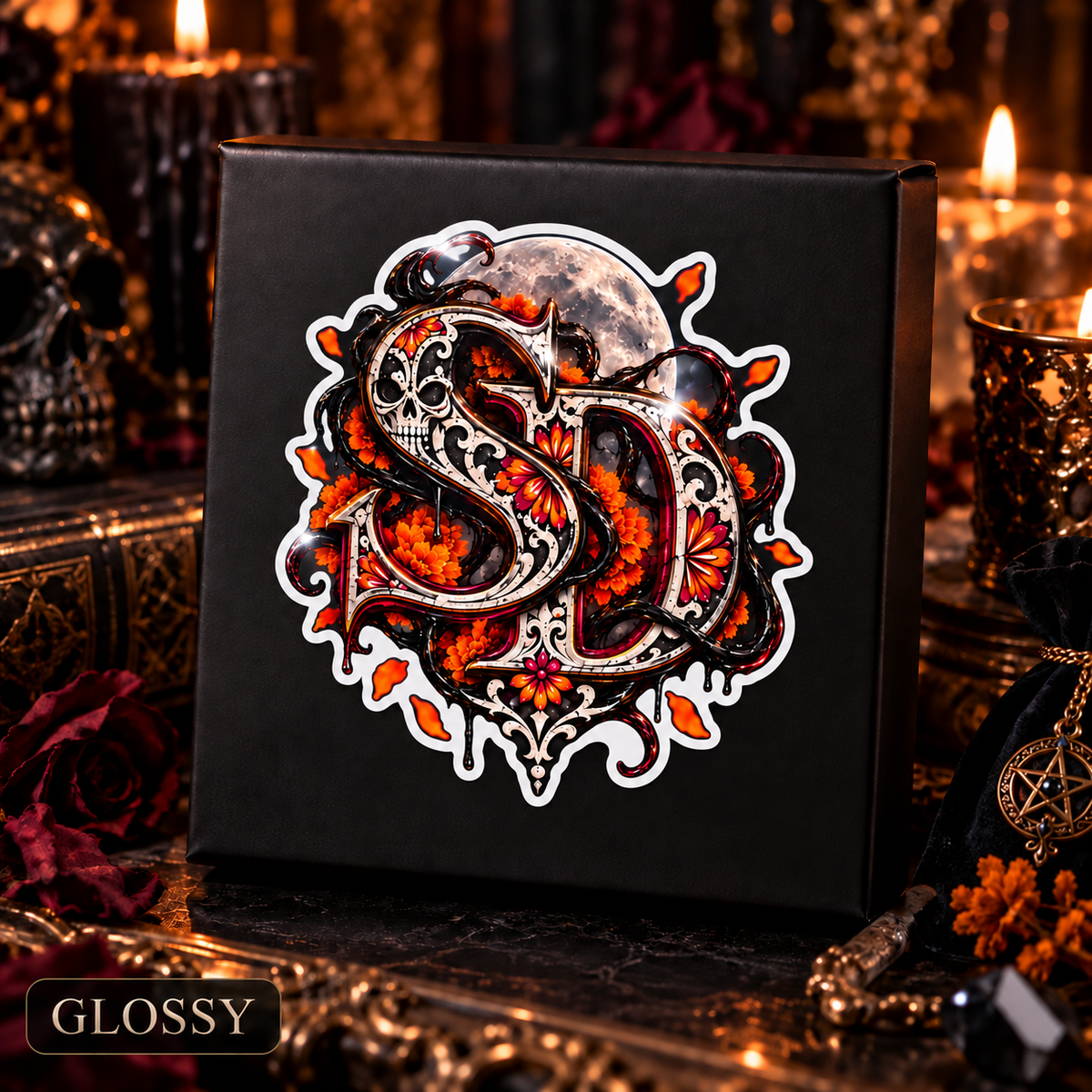 Glossy Día de los Muertos SD decal displayed on a black box amid candles.