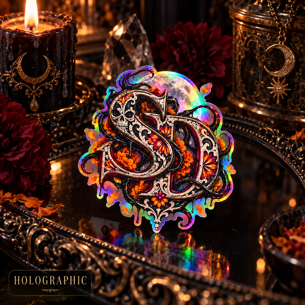 Holographic Día de los Muertos SD decal on a dark reflective tray surrounded by candles and flowers.