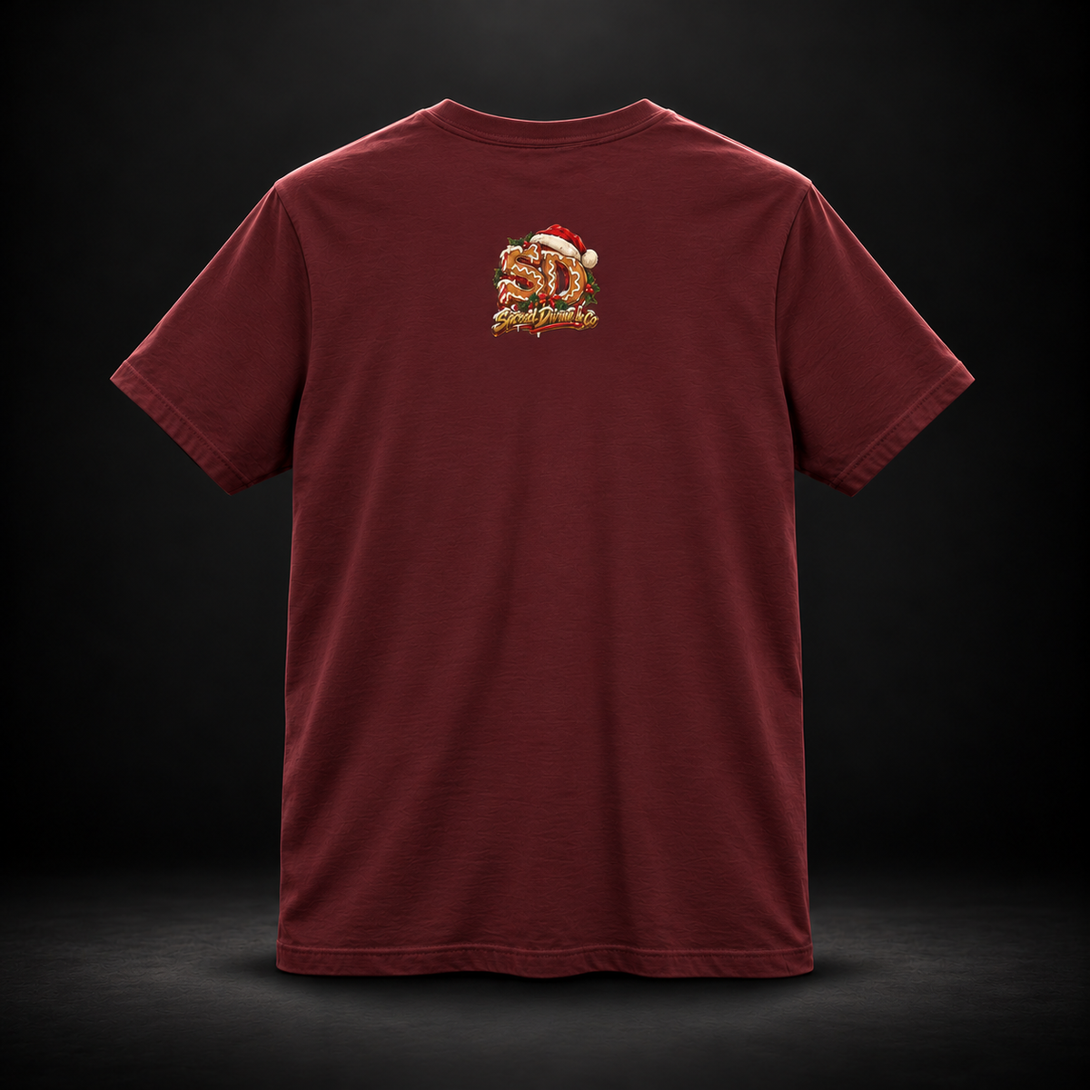 Maroon Gingerbread Outlaw Tee, back view with a holiday SD mark.