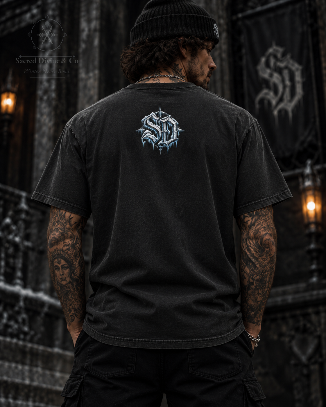 Model wearing a Vintage Black Gothic Snowman Tee, back view with an icy SD mark in a gothic setting.