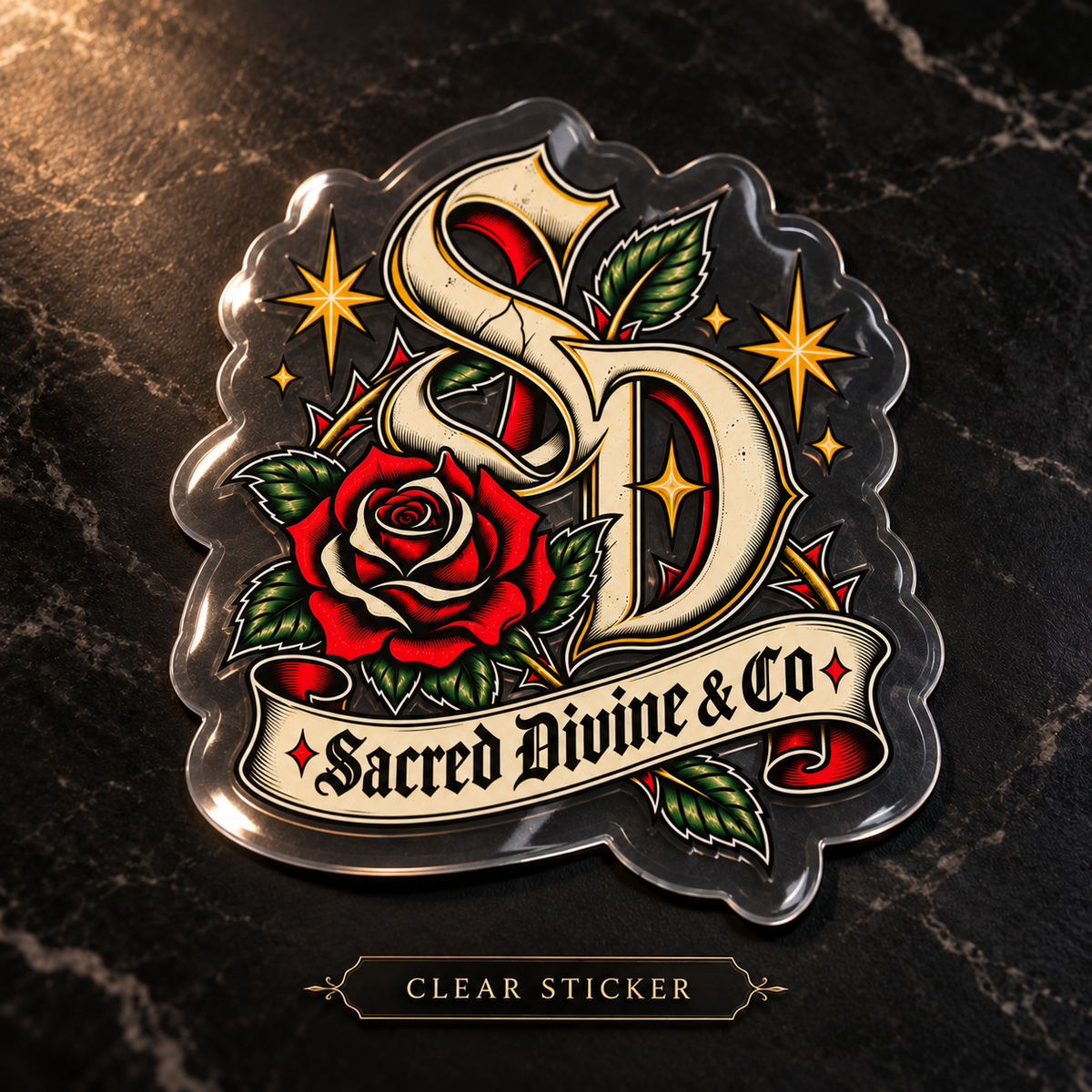 Gallery image 7: Sacred Divine Rose Monogram Decal featuring Sacred Divine SD monogram, red rose, green leaves, and gold stars.