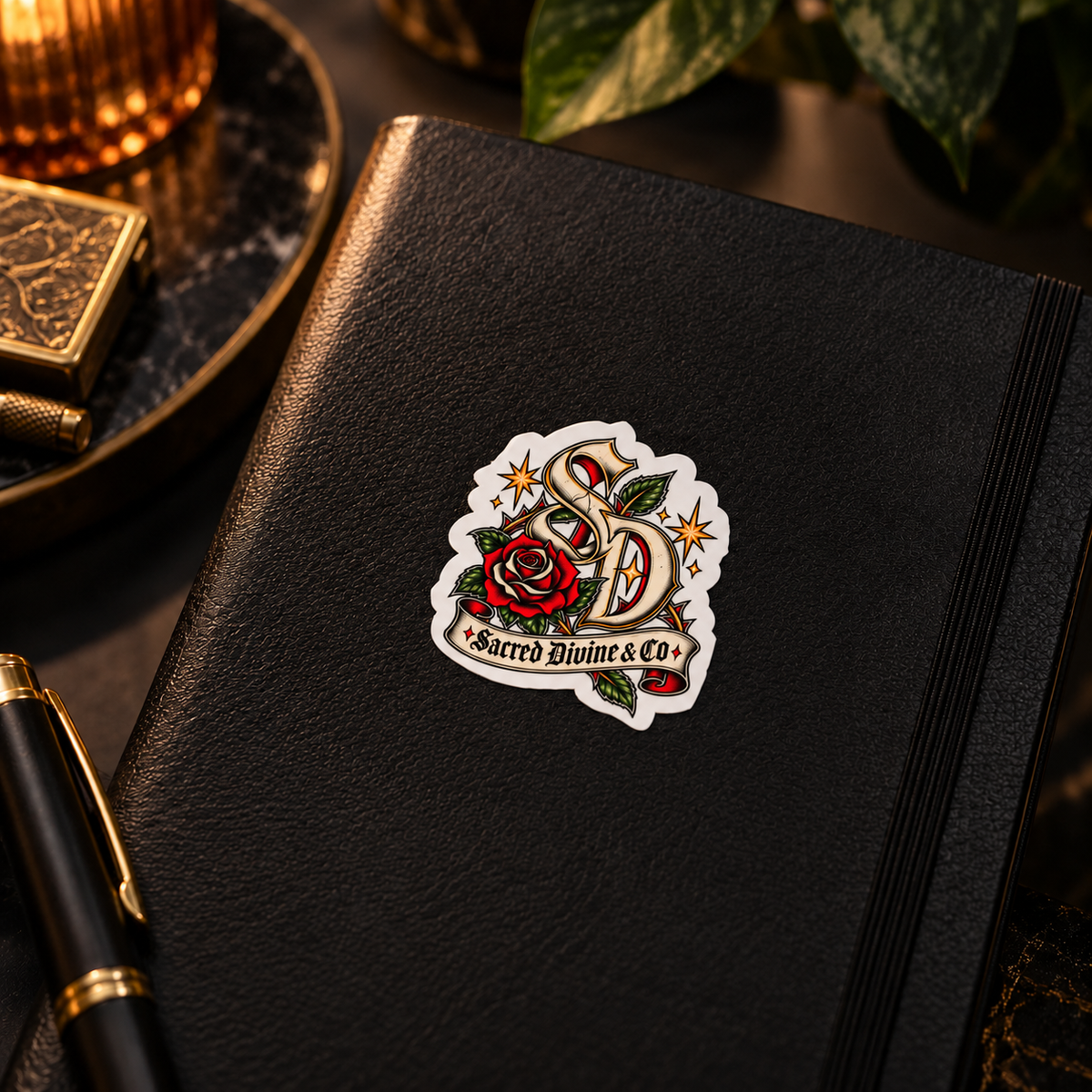 Gallery image 5: Sacred Divine Rose Monogram Decal featuring Sacred Divine SD monogram, red rose, green leaves, and gold stars.