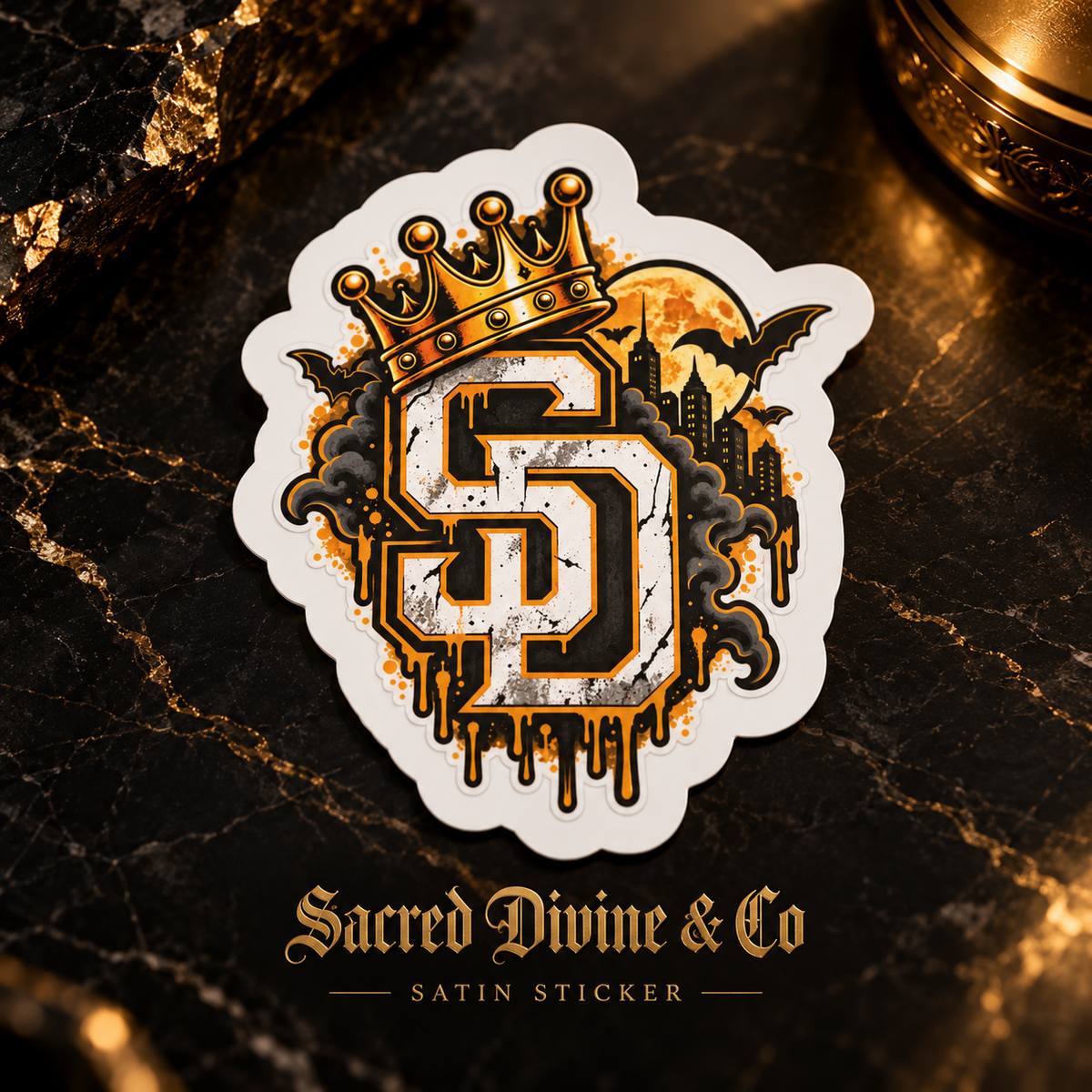 Gallery image 6: Crowned SD Cityscape Decal featuring crowned SD monogram, moonlit city skyline, bats, and gold accents.