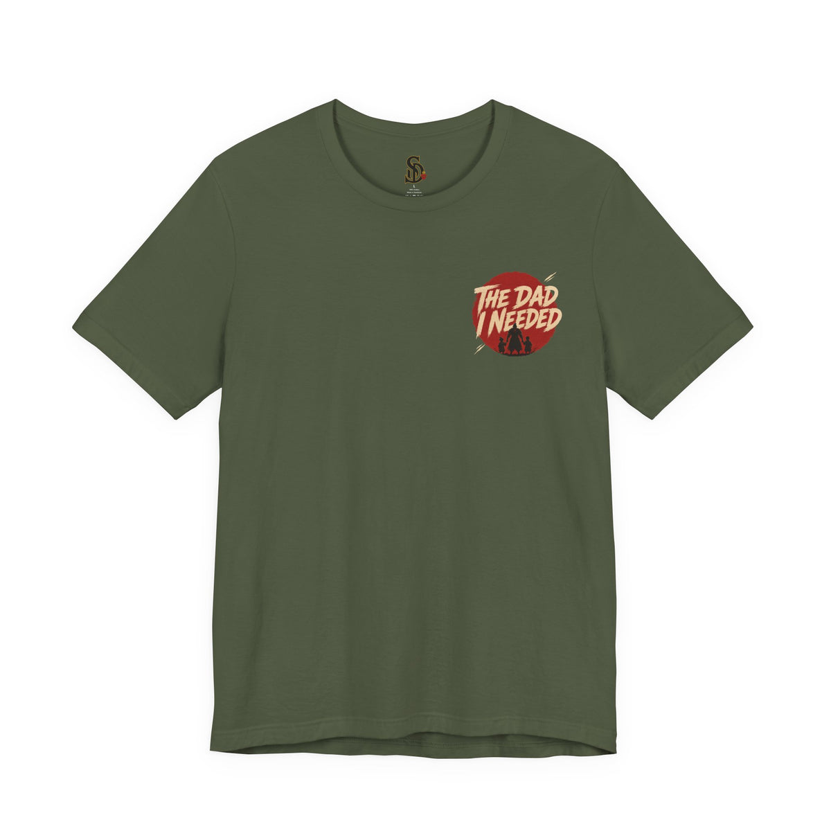 Built Different Tee military green front flat-lay — The Dad I Needed red circle left chest badge with SD monogram neck label