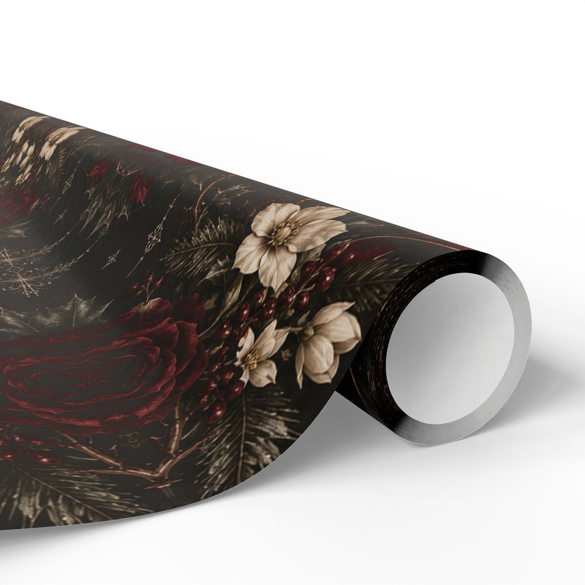Close-up of a Dark Vintage Floral wrapping paper roll curling outward, showing charcoal paper with small burgundy and ivory botanical medallions.