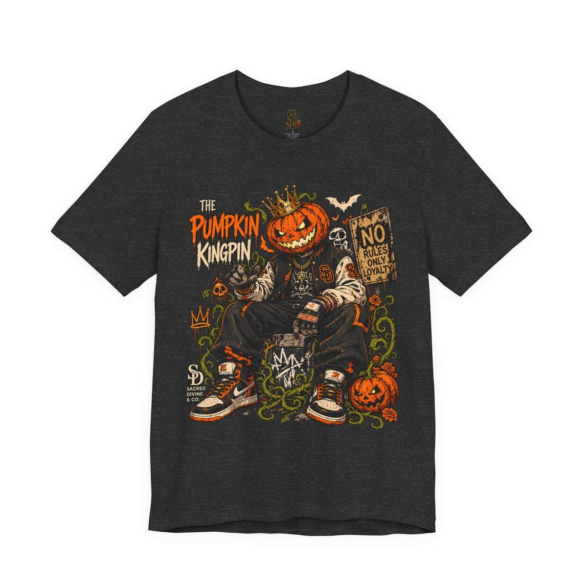 The Pumpkin Kingpin Tee product mockup with crowned jack-o'-lantern holding a No Rules Only Loyalty sign