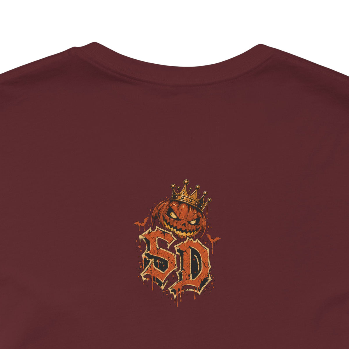 Pumpkin Kingpin Crew Tee product mockup featuring crowned jack-o'-lantern kingpin and crew artwork