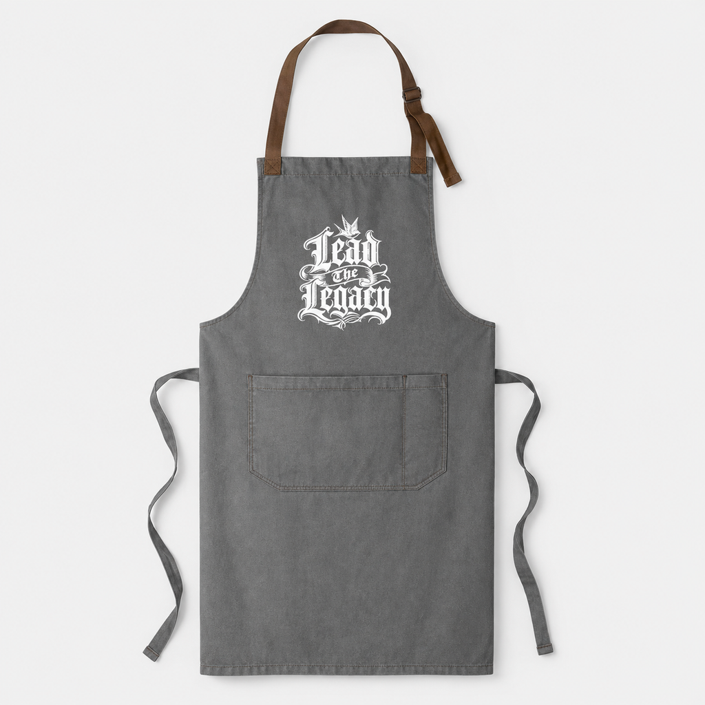 Sacred Divine & Co. Lead the Legacy Gothic Crest Bib Apron — Dark Luxury Kitchen & Grill