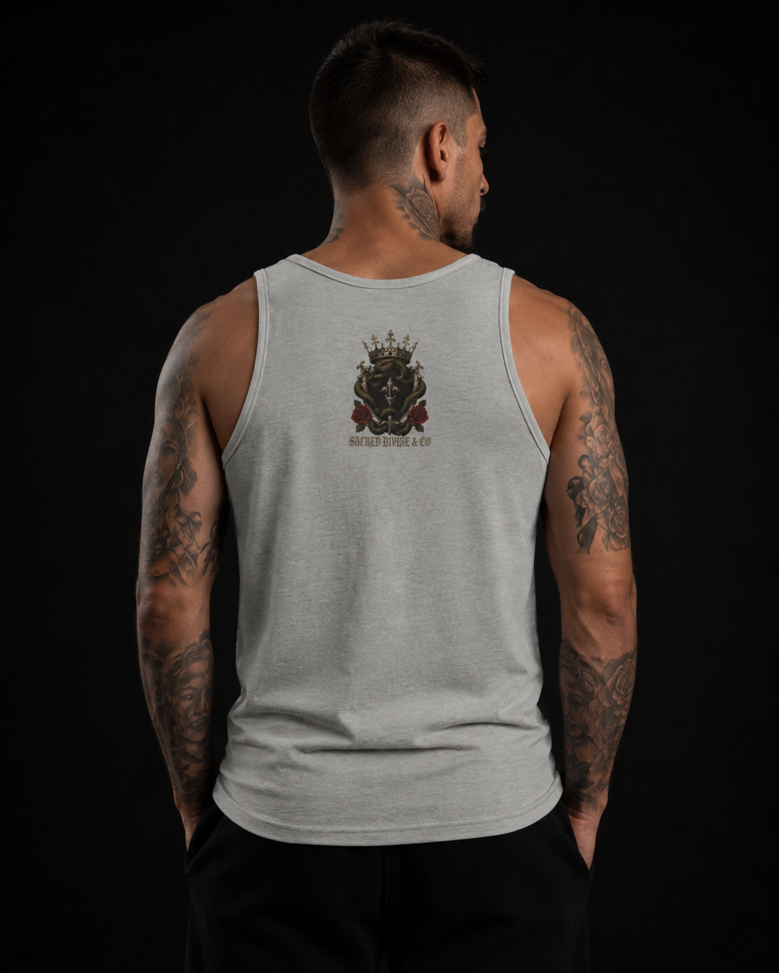 Family First Always Tank athletic heather back lifestyle — model wearing tank with gothic crown crest and Sacred Divine & Co. wordmark upper back graphic