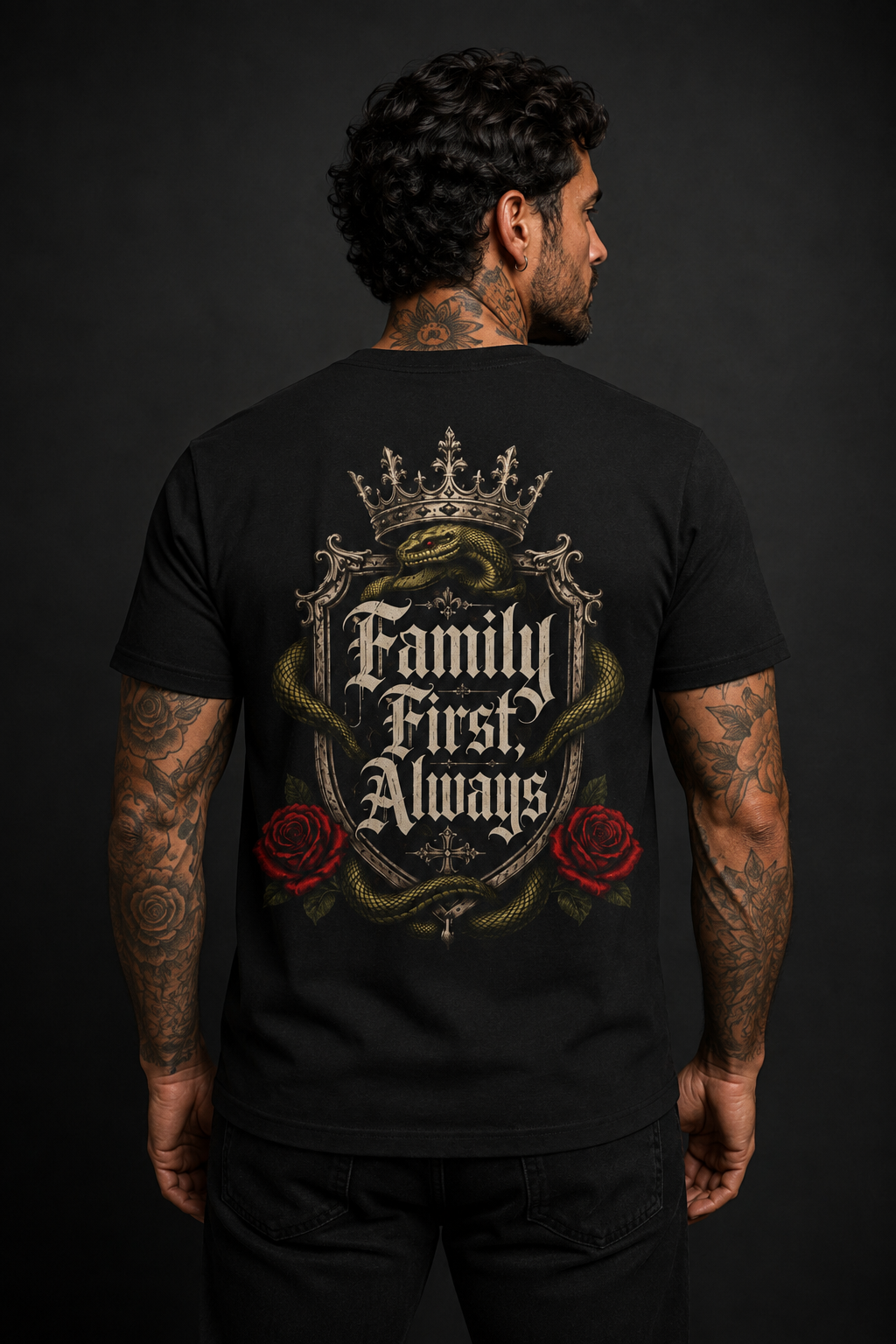 Family First Always Tee black back lifestyle — model wearing tee with Family First Always gothic crest full back graphic and Sacred Divine & Co. wordmark