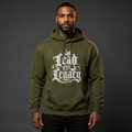Lead the Legacy Hoodie army green front lifestyle — model wearing hoodie with Lead the Legacy gothic script center chest graphic