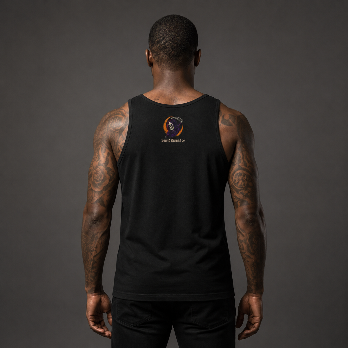 Grim Reaper Pegasus Tank black back lifestyle — model wearing tank with Grim Reaper skull flame circle Sacred Divine & Co. left chest logo