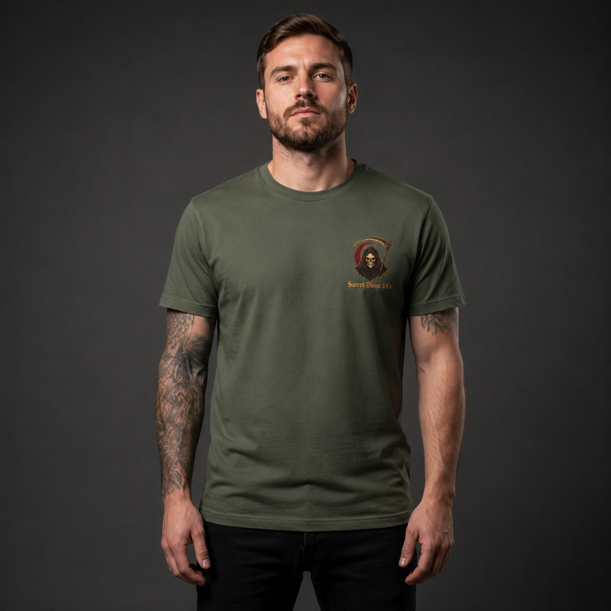 Grim Reaper Graphic Tee military green front lifestyle — model wearing tee with Grim Reaper skull scythe red circle Sacred Divine & Co. left chest graphic