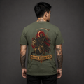 Grim Reaper Graphic Tee military green back lifestyle — model wearing tee with Grim Reaper on skeleton horse scythe crescent moon Sacred Divine & Co. scroll banner full back graphic