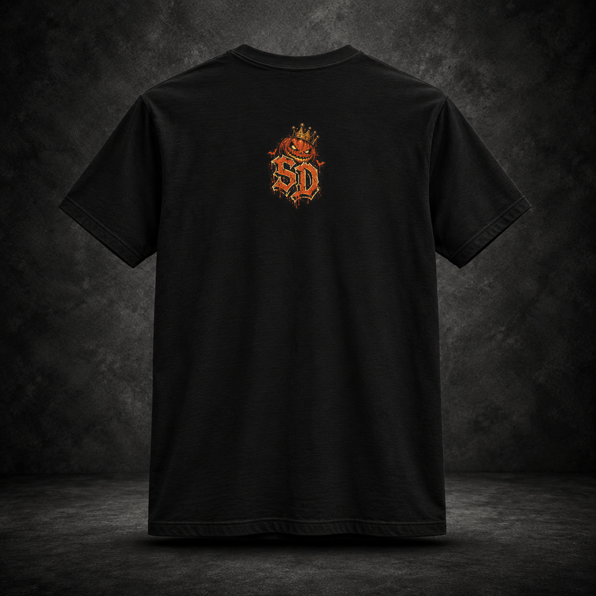 Pumpkin Kingpin Crew Tee styled product image featuring crowned jack-o'-lantern kingpin and crew artwork