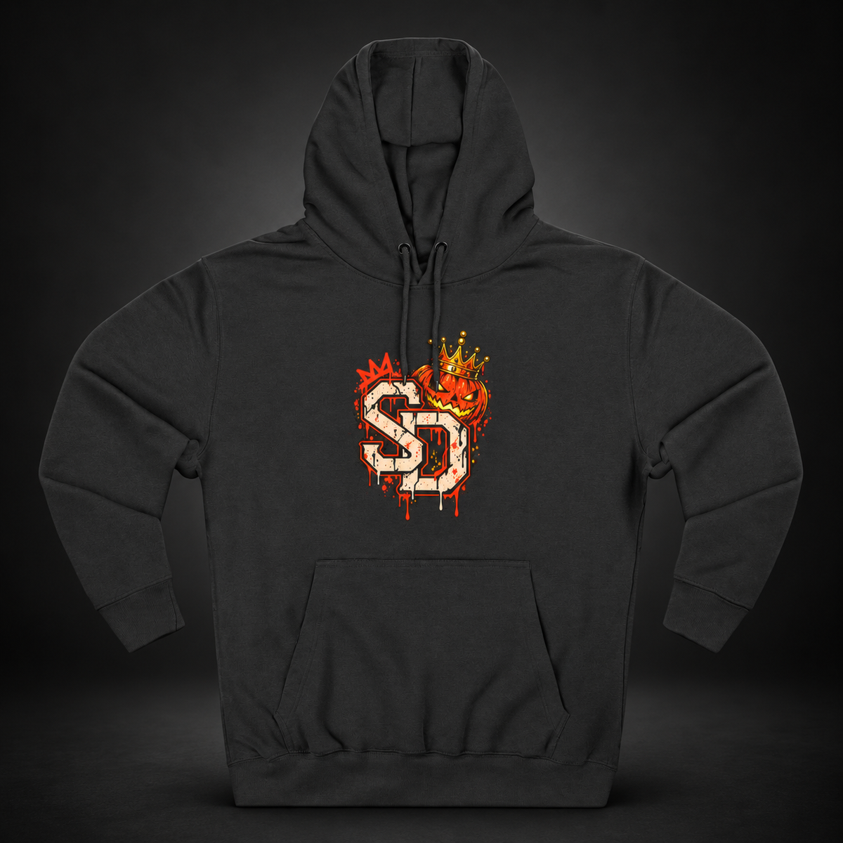 Charcoal Heather Pumpkin King Hoodie, front view against a dark backdrop with a cream-and-orange SD crest with crowned jack-o'-lantern details on the chest.